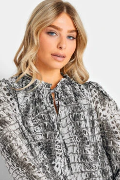 M&Co White Abstract Print Tie Neck Blouse 10 M&Co White Abstract Print Tie Neck Blouse -M&Co Sales Store c0363e05 d18d 47 550676 D scaled